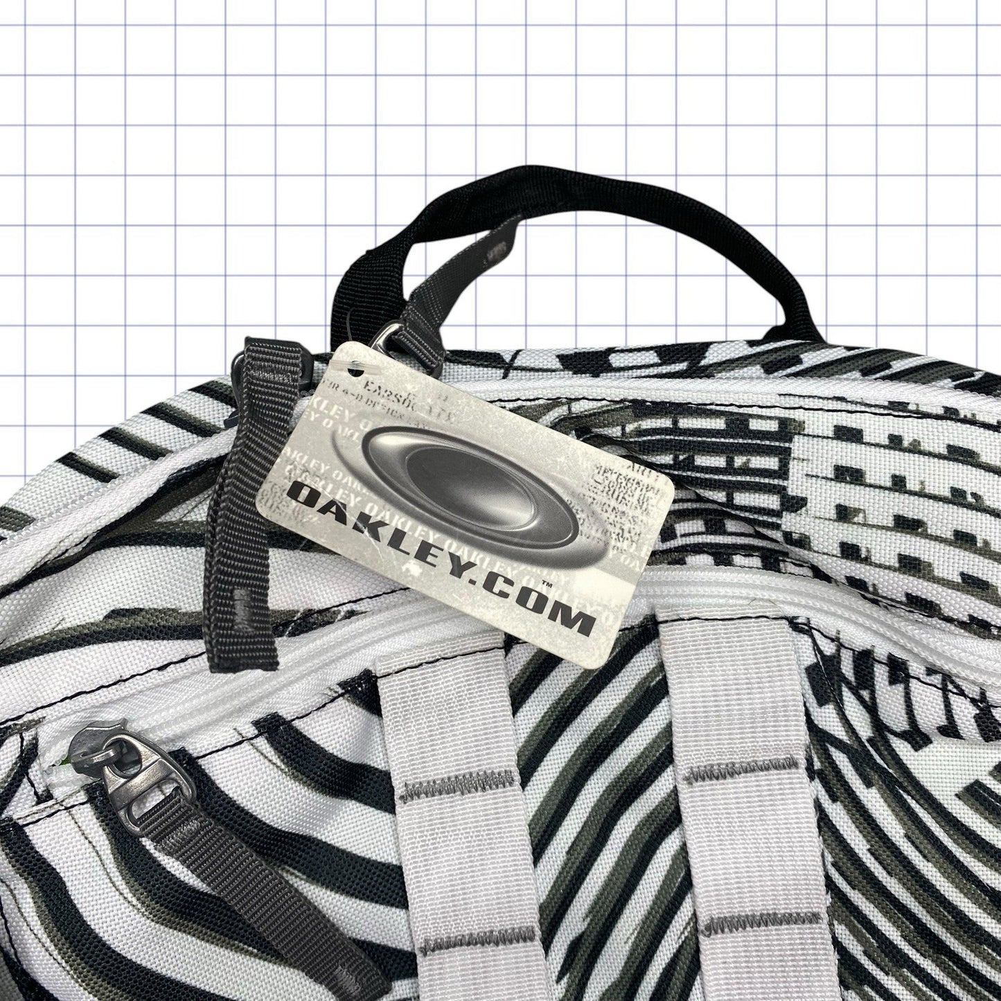 Early 2000s Oakley Gridded Pattern Backpack